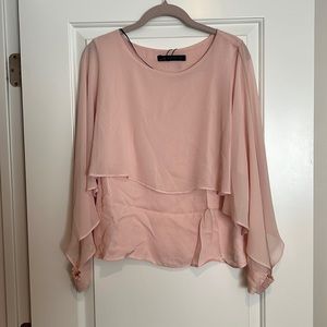 Pink blouse with sheer covering